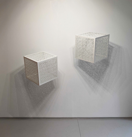 Itinerant Shadows - White (Bola and Arches), white laser-cut lacquered steel &amp;amp; light bulbs, 24 x 24 x 24 inches/61 x 61 x 61 cm each