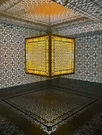 Anila Quayyum Agha, Hidden Diamond - Saffron, 2019, laser-cut, lacquered steel, 48 x 48 x 48 inches/122 x 122 x 122 cm