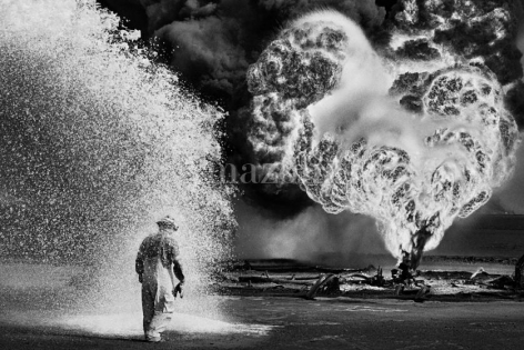 , Sebasti&atilde;o Salgado. Oil wells firefighter. Greater Burhan, Kuwait. 1991. Gelatin silver print. 180 x 125 cm.
