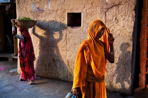 Women return from the bazaar in the evening, Rajasthan, India, 2009,&nbsp;ultrachrome print, 30 x 40 inches/76.2 x 101.6 cm