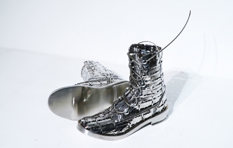 Tayeba Lipi, The Colombian Boots, 2019, stainless steel, 8 x 11 x 8 inches/20.3 x 27.9 x 20.3 cm